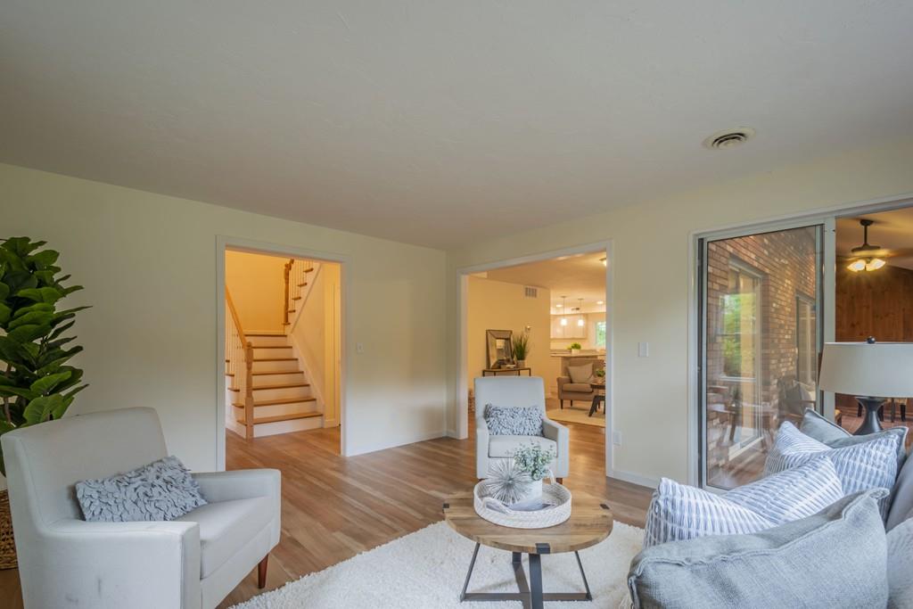 1 Kingman Road Acton, MA 01720 - Photo 8 of 42 a living room with furniture and wooden floor