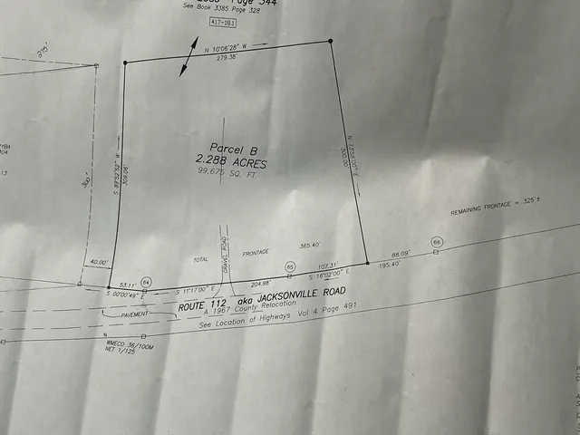 a bathroom with a shower and vanity
