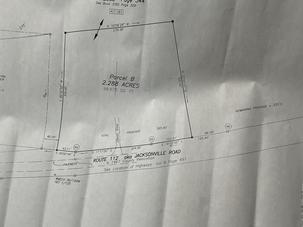0 Jacksonville Road Colrain, MA 01340 - Photo 2 of 2 a bathroom with a shower and vanity
