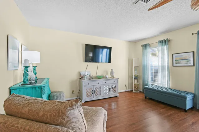 a kitchen with stainless steel appliances granite countertop a stove a refrigerator and a microwave