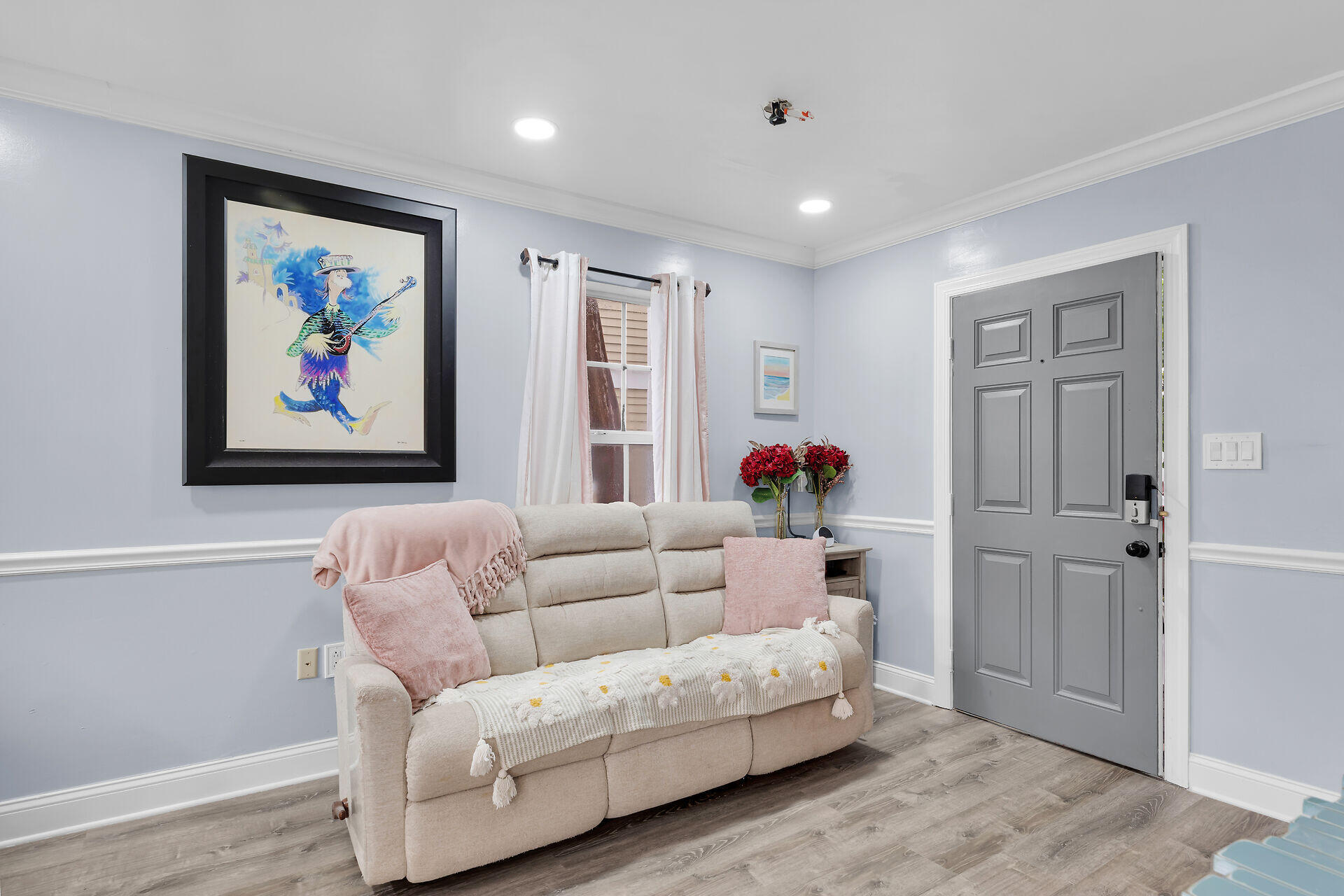 3029 North Roosevelt Boulevard, Unit 54 Key West, FL 33040 - Photo 3 of 31 a living room with furniture and a painting