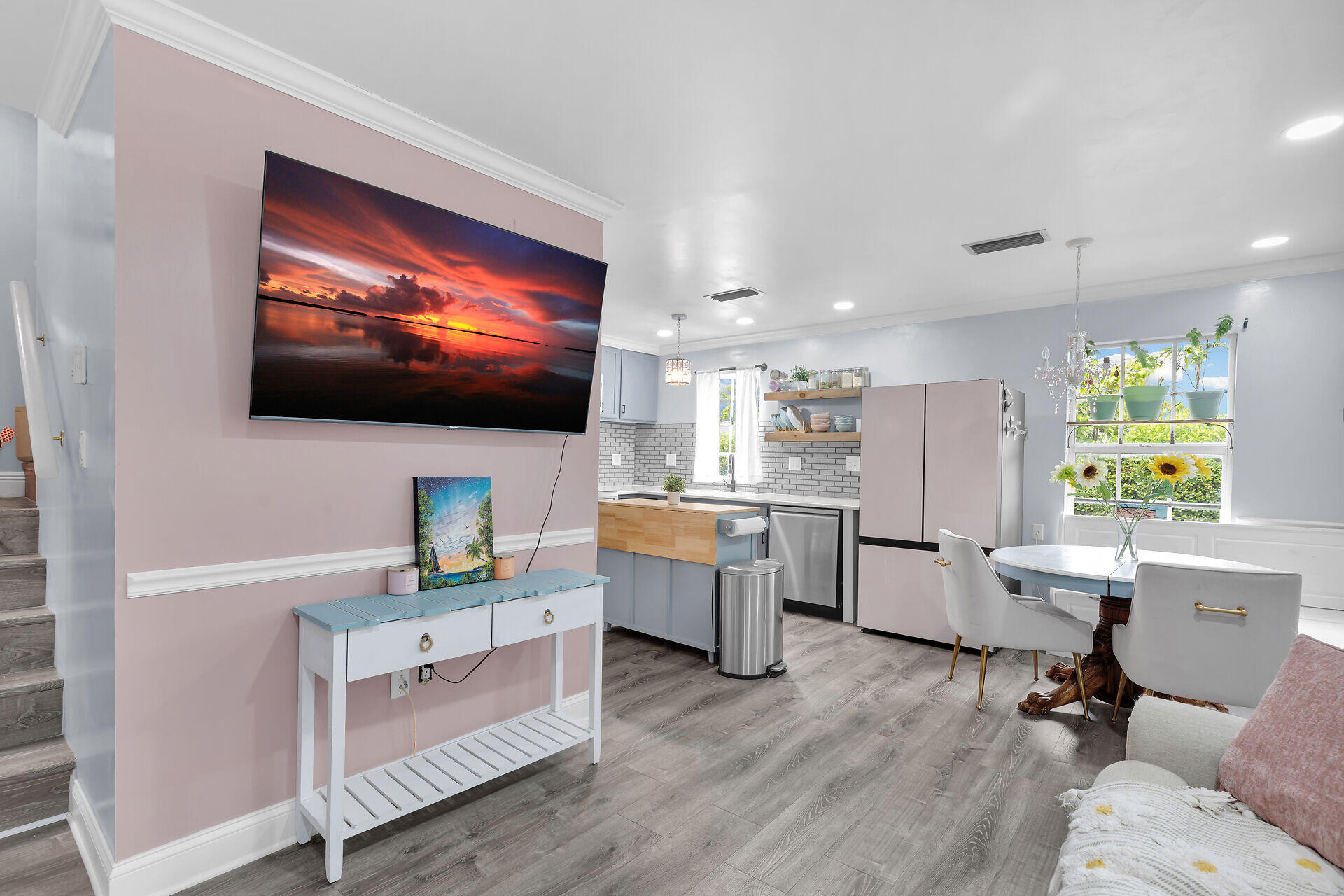 3029 North Roosevelt Boulevard, Unit 54 Key West, FL 33040 - Photo 5 of 31 a living room with furniture and a flat screen tv