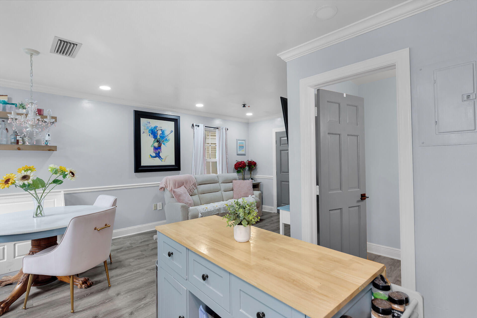 3029 North Roosevelt Boulevard, Unit 54 Key West, FL 33040 - Photo 6 of 31 a living room with furniture and a table