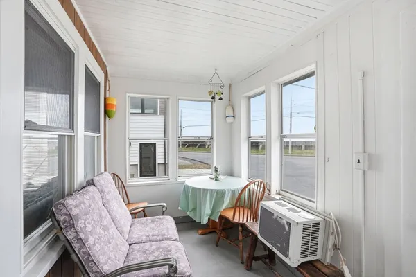 a living room with furniture and a table