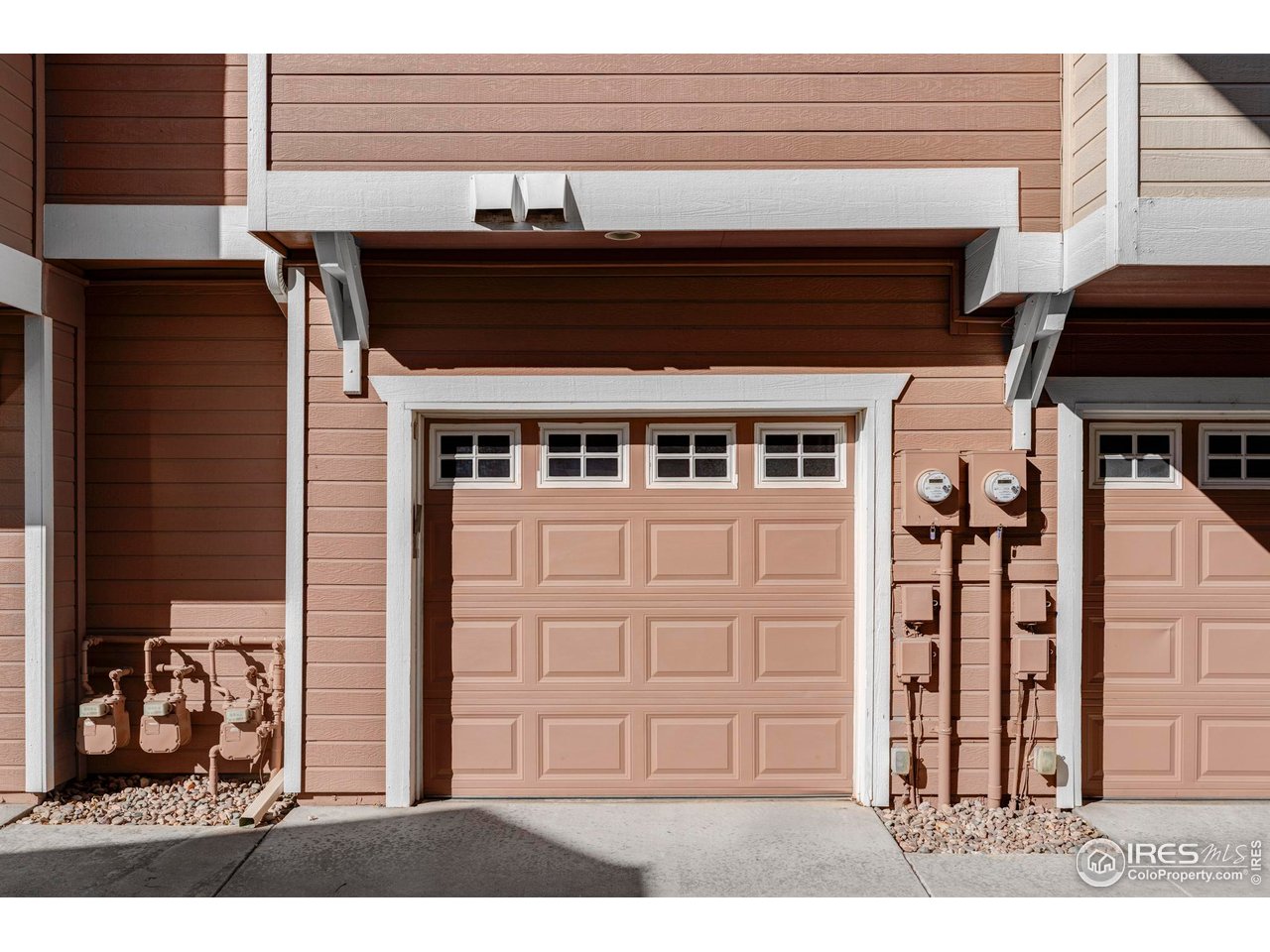 4240 Riley Drive Longmont, CO 80503 - Photo 25 of 25 An attached two-car garage includes extra storage for outdoor gear and seasonal items.