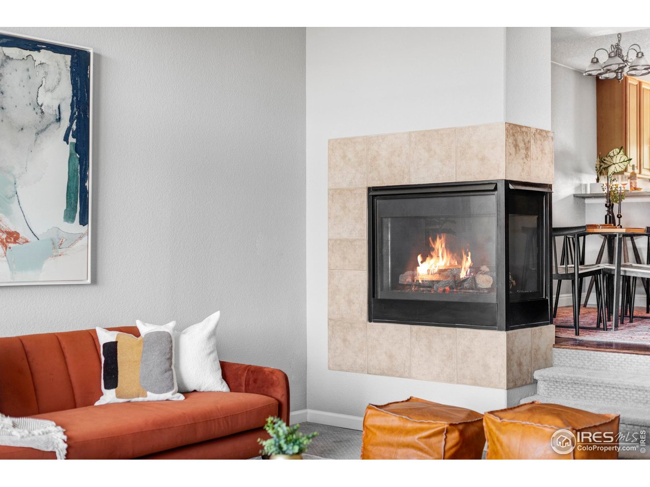 4240 Riley Drive Longmont, CO 80503 - Photo 10 of 25 Living room and gas fireplace.