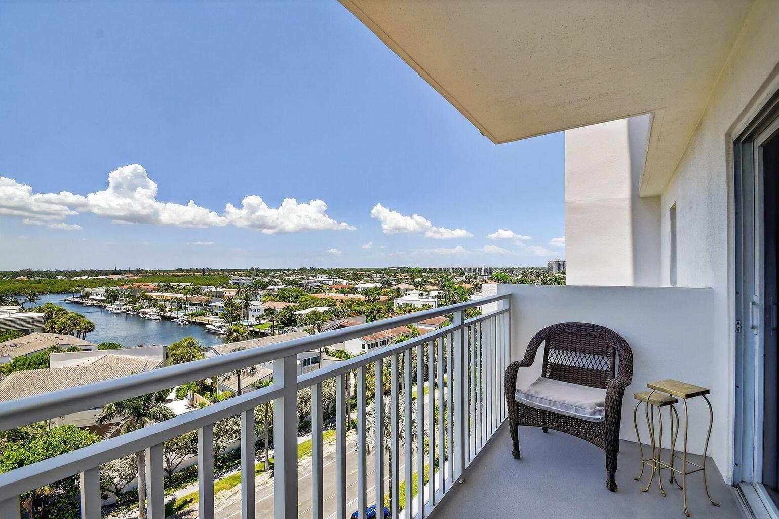 4511 South Ocean Boulevard, Unit 701 Highland Beach, FL 33487 - Photo 10 of 16 a view of a chairs and table in a balcony