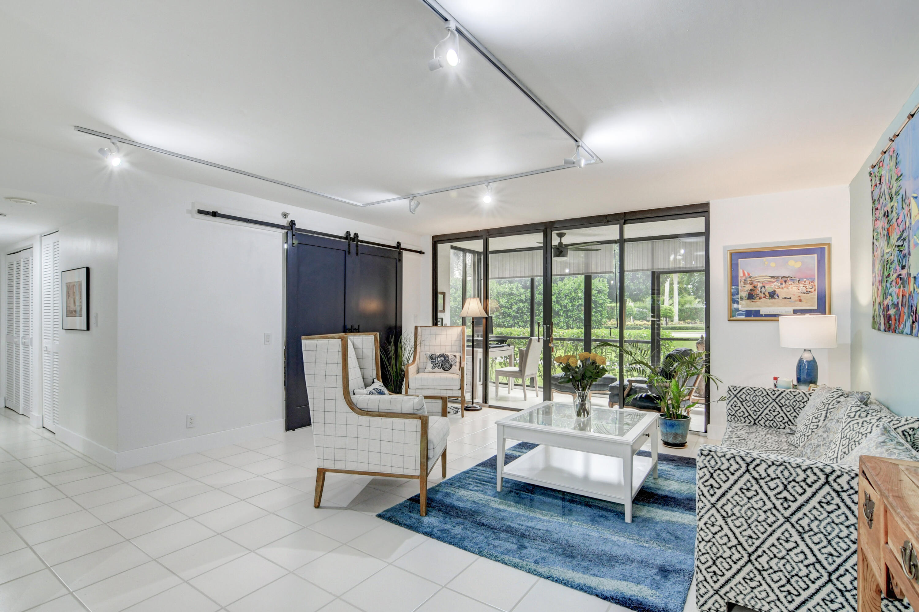 7568 Regency Lake Drive, Unit B101 Boca Raton, FL 33433 - Photo 9 of 37 Living Room