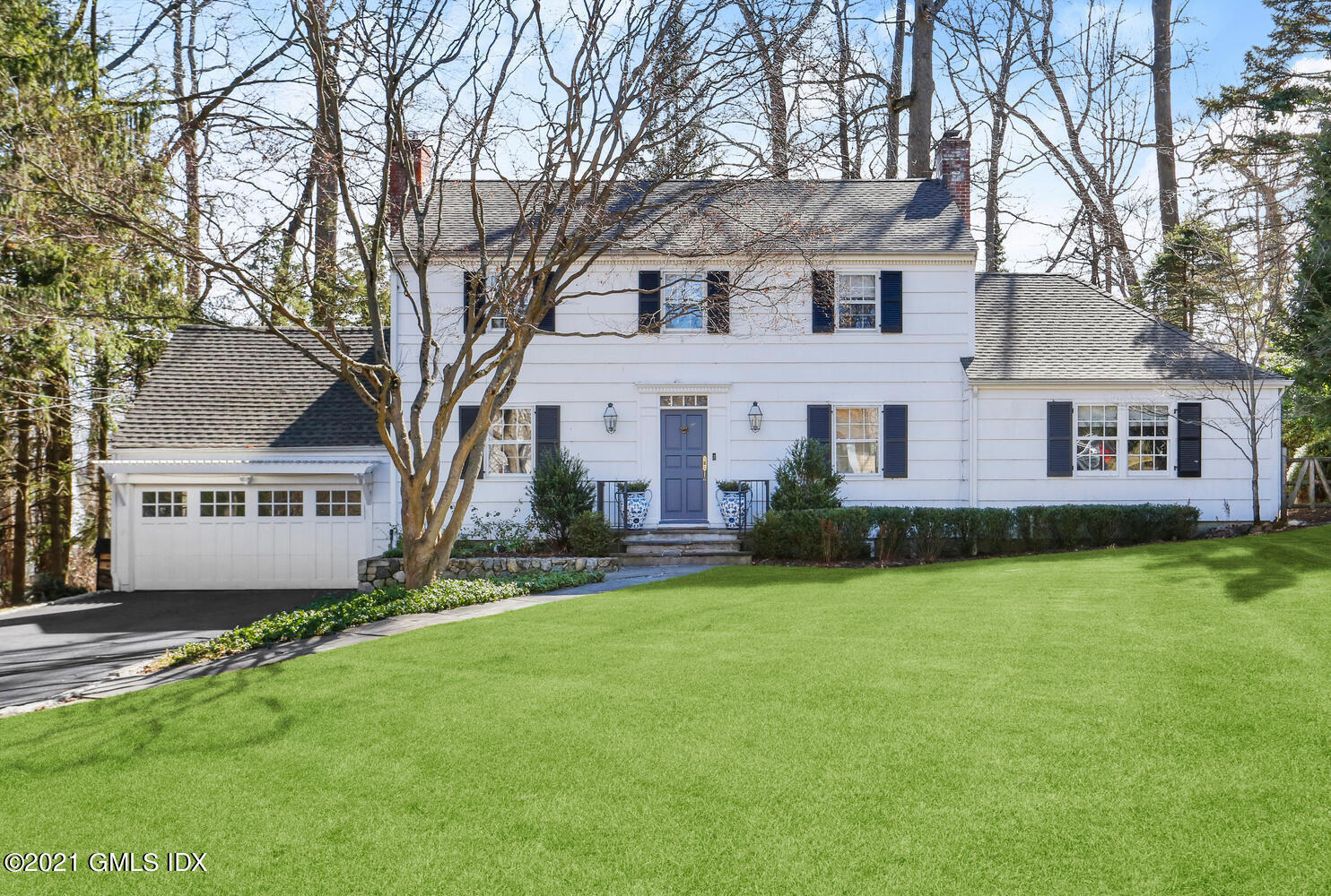 52 Winthrop Drive Riverside, CT 06878 - Photo 1 of 34 front view of a house with a yard