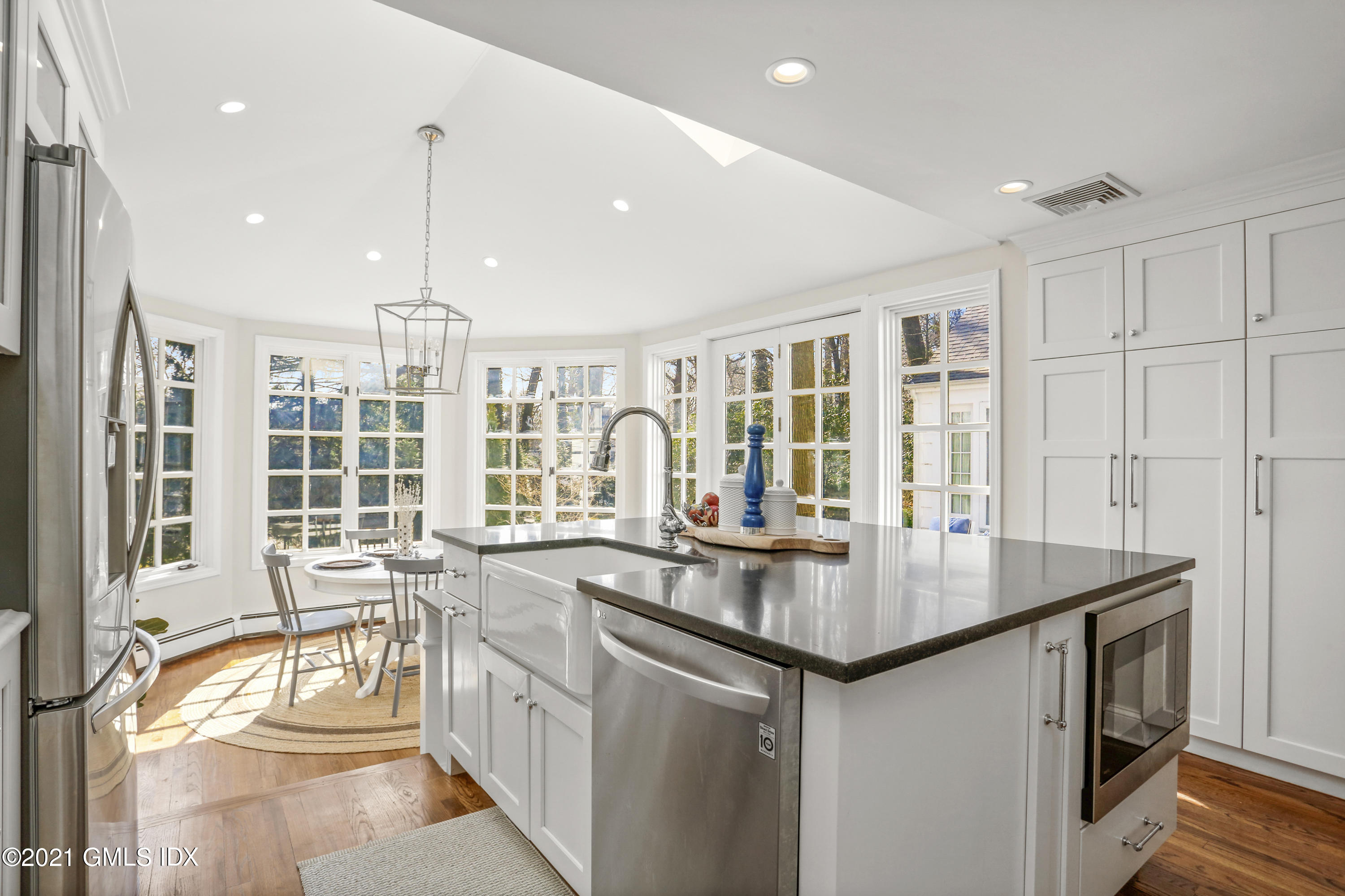 52 Winthrop Drive Riverside, CT 06878 - Photo 13 of 34 a kitchen with stainless steel appliances granite countertop a stove a sink and a refrigerator
