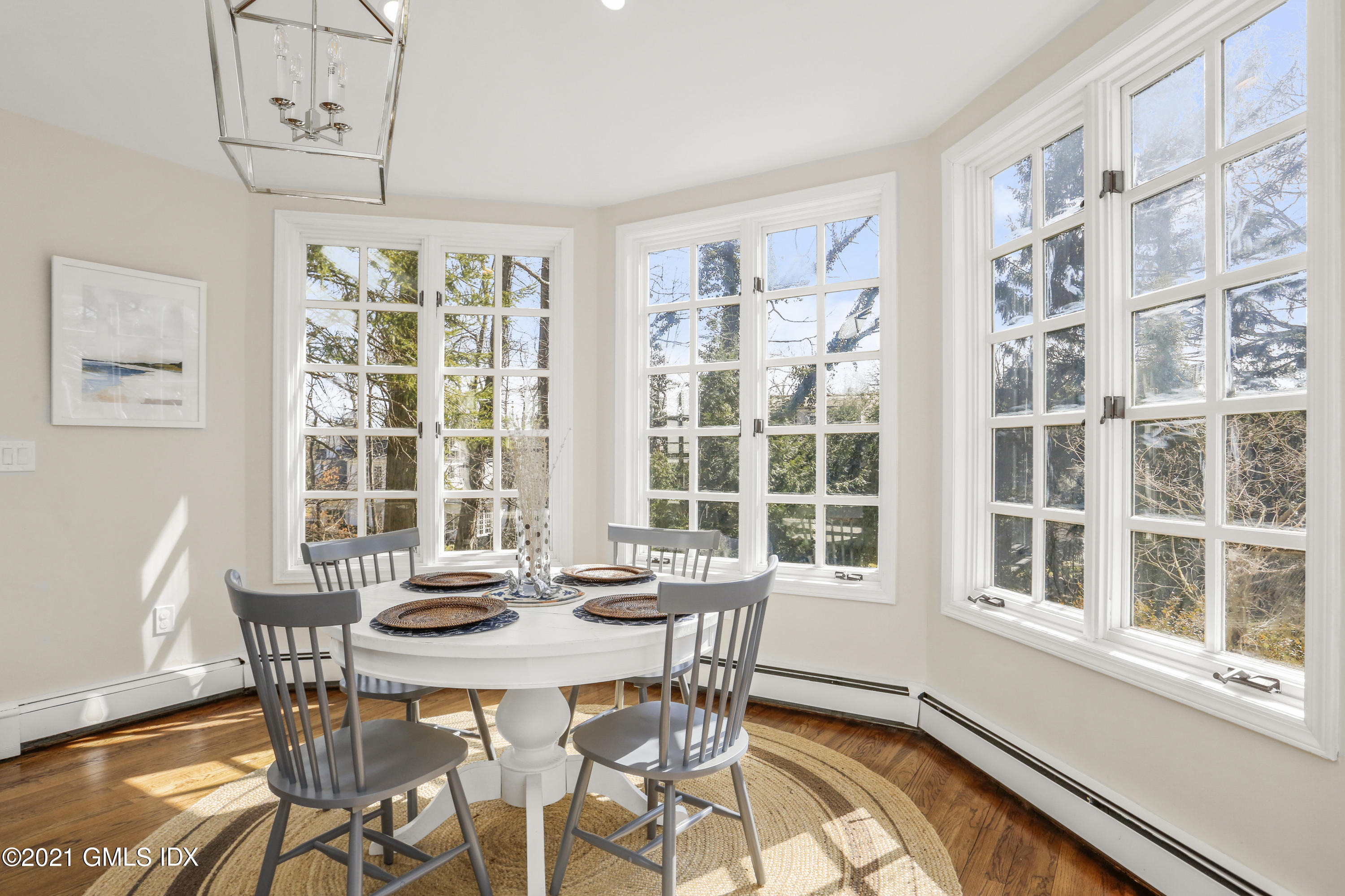 52 Winthrop Drive Riverside, CT 06878 - Photo 15 of 34 a view of a dining room with furniture window and wooden floor