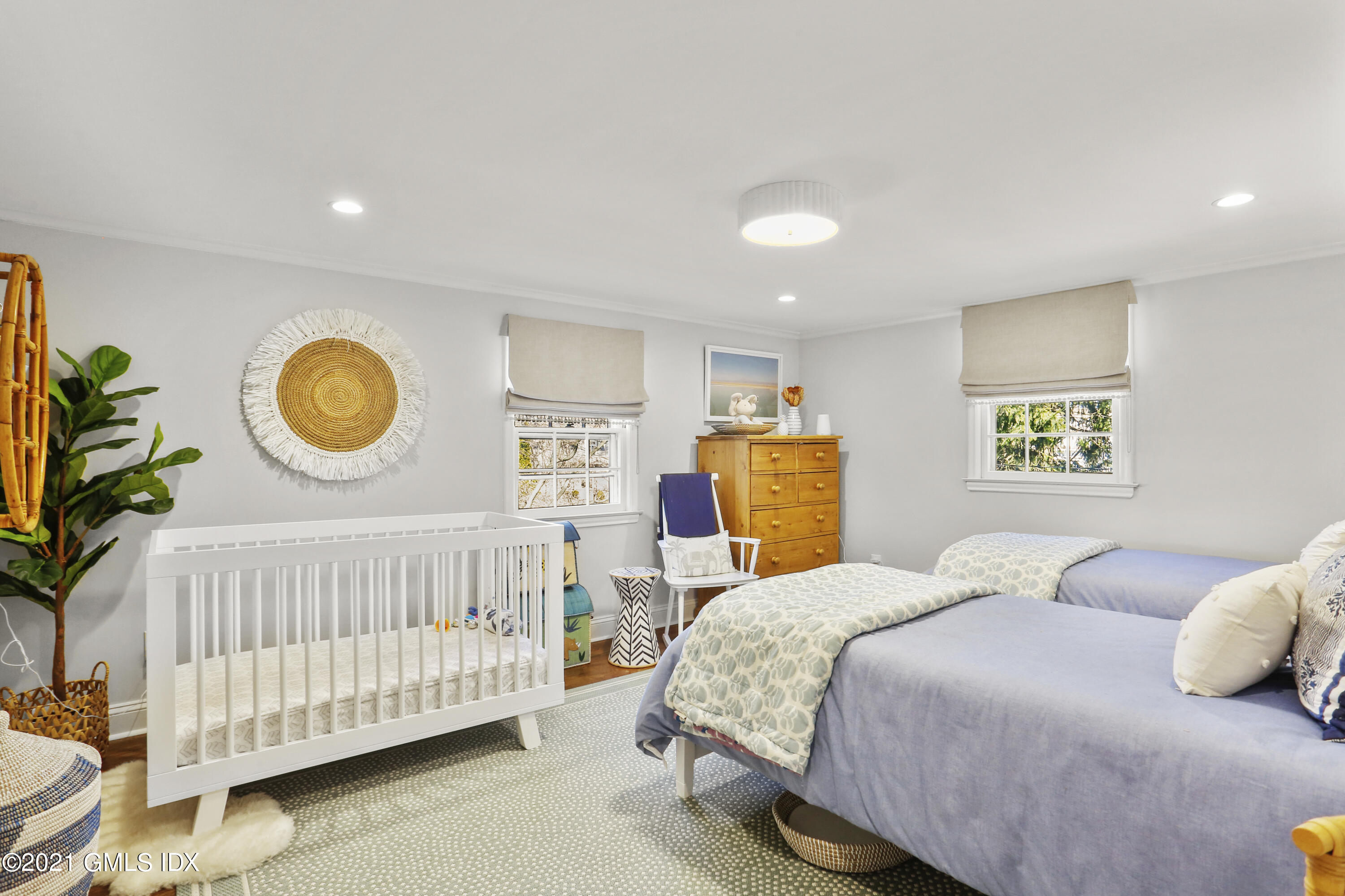 52 Winthrop Drive Riverside, CT 06878 - Photo 20 of 34 a bedroom with a bed and a window