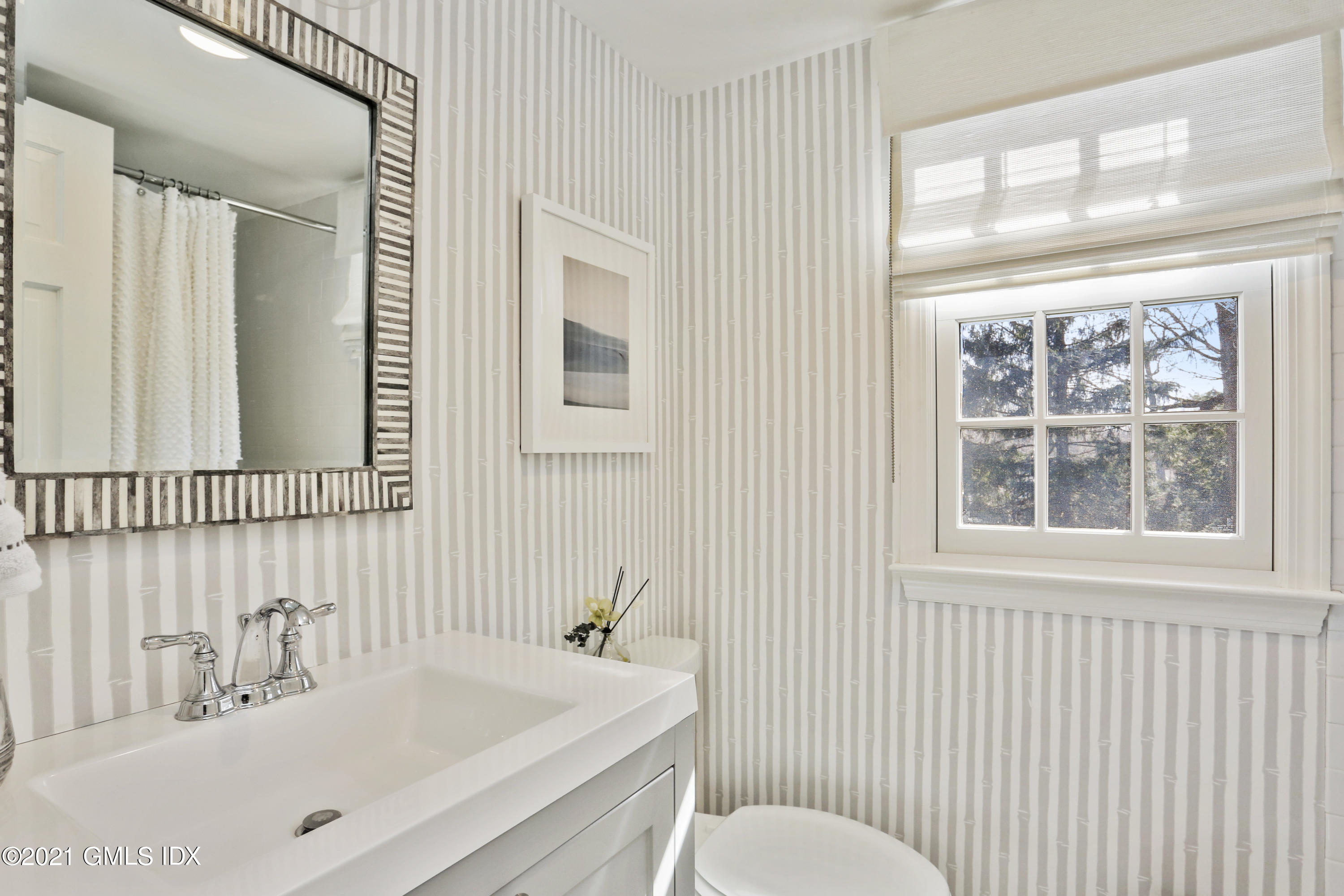 52 Winthrop Drive Riverside, CT 06878 - Photo 22 of 34 a bathroom with a sink and a mirror