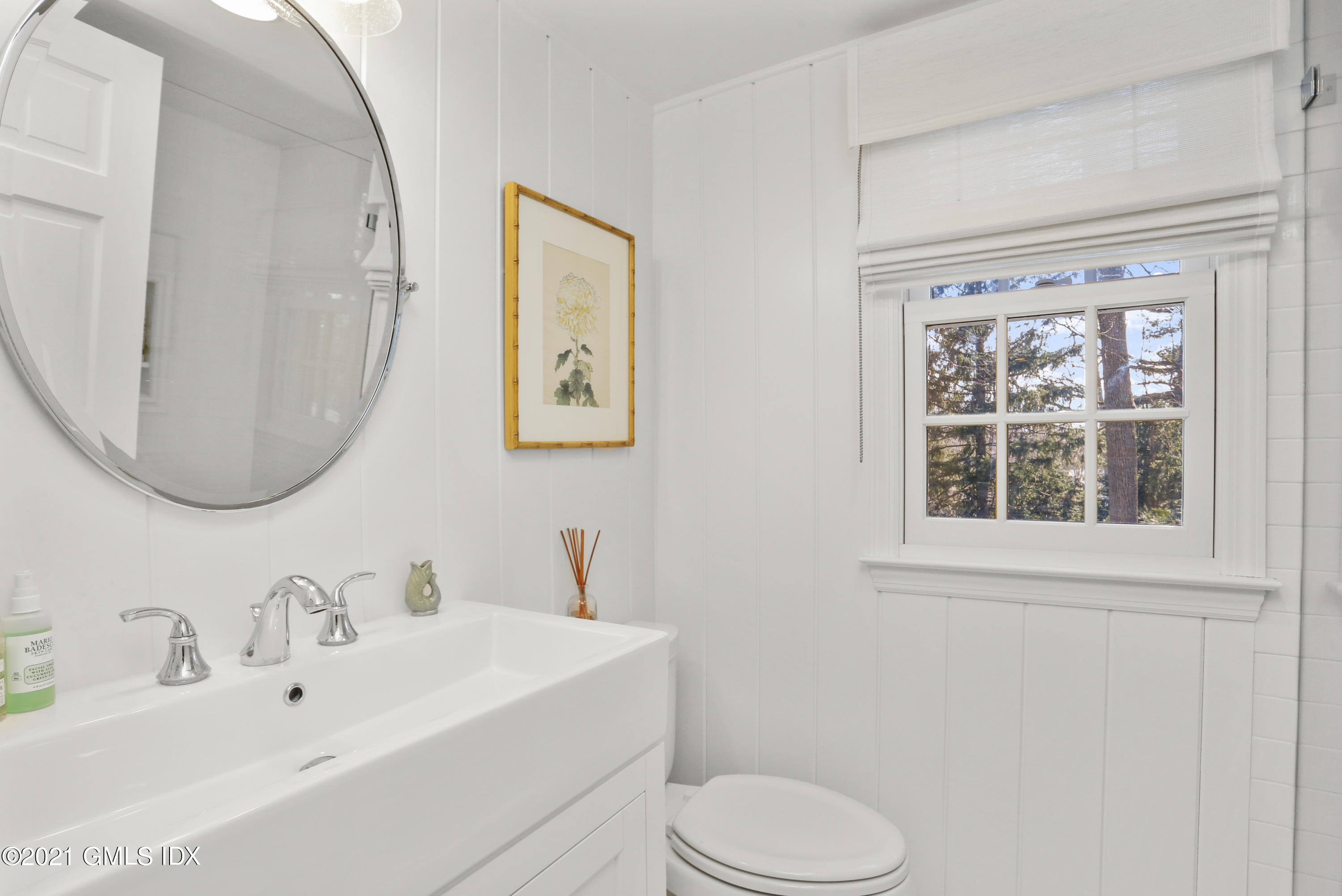 52 Winthrop Drive Riverside, CT 06878 - Photo 25 of 34 a bathroom with a toilet a sink and mirror