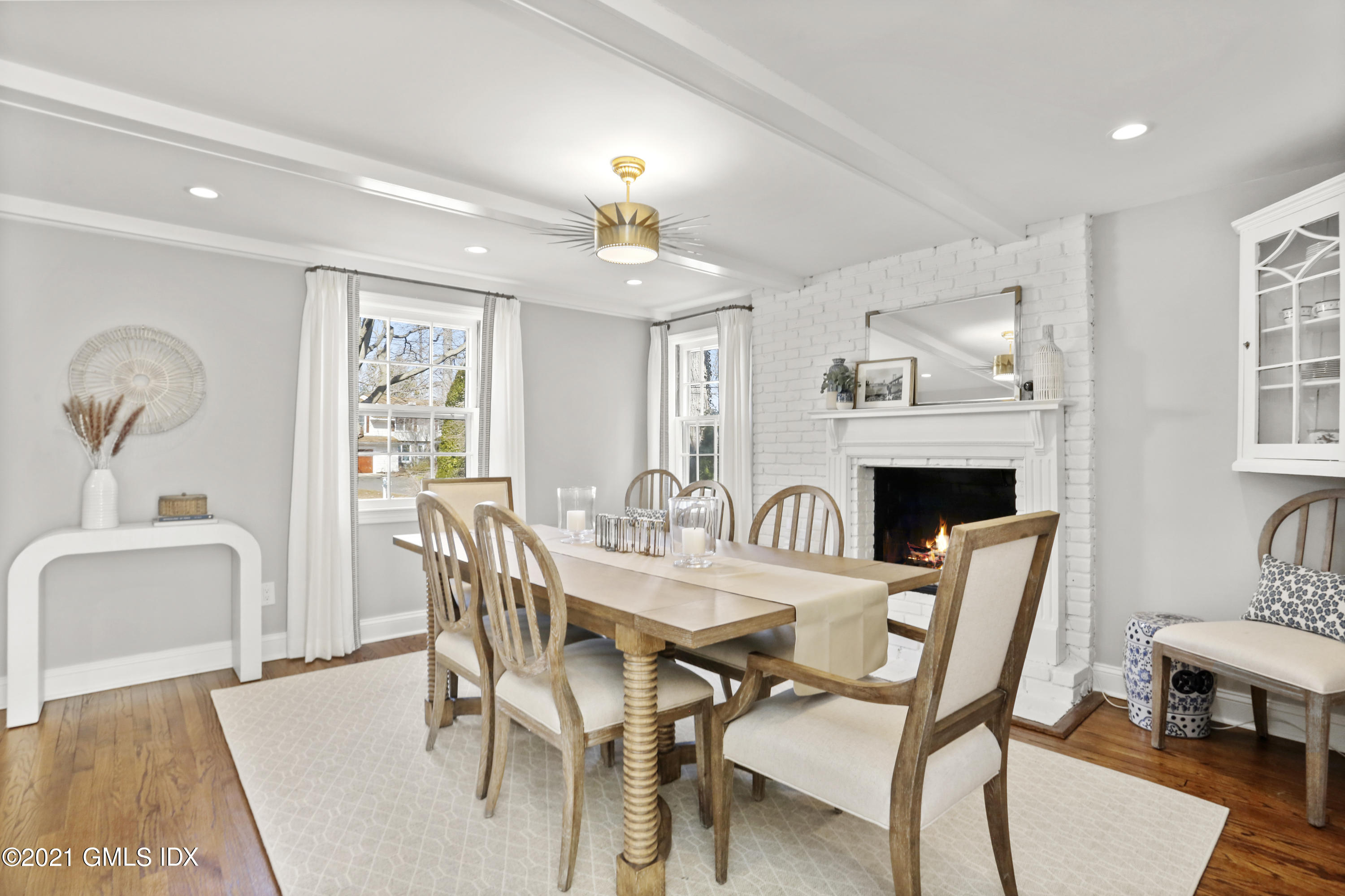52 Winthrop Drive Riverside, CT 06878 - Photo 6 of 34 a view of a dining room with furniture and chandelier