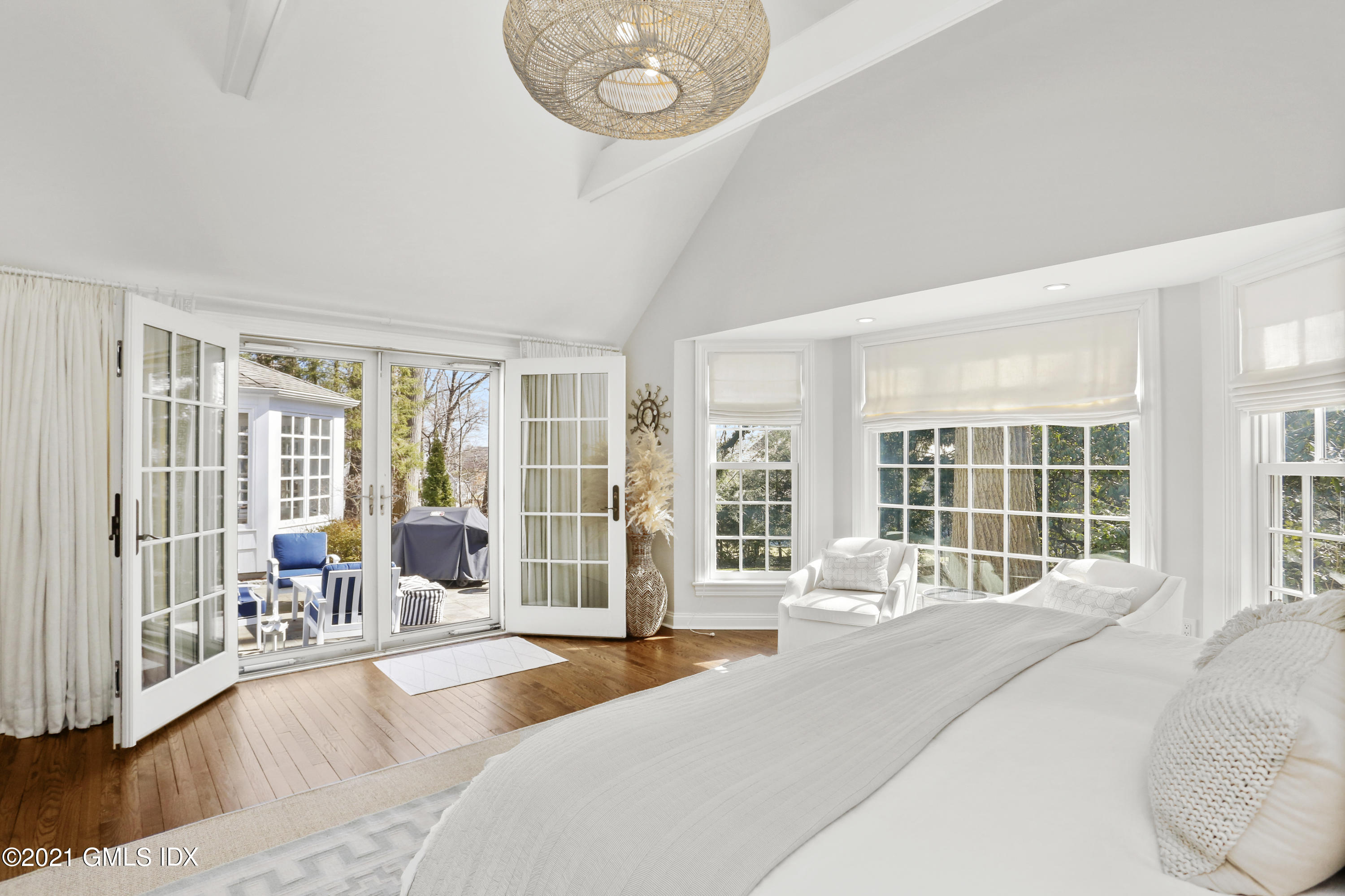 52 Winthrop Drive Riverside, CT 06878 - Photo 8 of 34 a spacious bedroom with a large bed and a large window