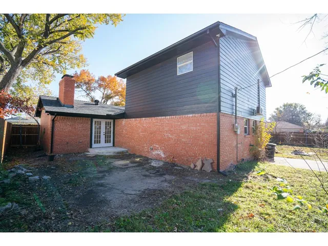a view of a backyard of the house