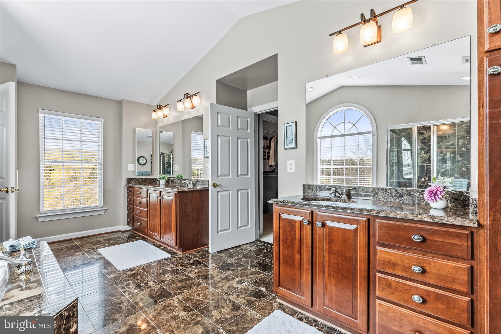 40 Fawn Hill Road Hanover, PA 17331 - Photo 45 of 99 a large spacious bathroom with a granite countertop tub a sink and a large mirror