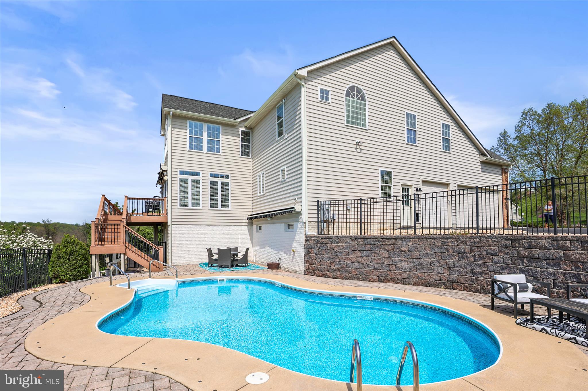 40 Fawn Hill Road Hanover, PA 17331 - Photo 76 of 99 a view of a house with swimming pool and sitting area