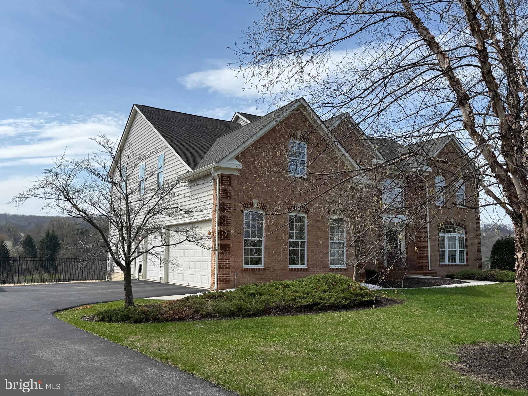 40 Fawn Hill Road Hanover, PA 17331 - Photo 85 of 99 a front view of a house with a garden and trees