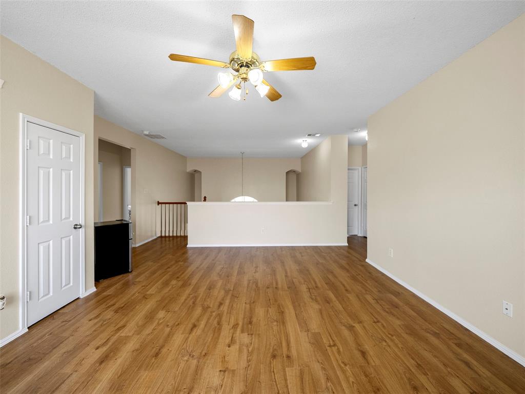 741 Aspen Court Allen, TX 75002 - Photo 38 of 40 upstairs living room featuring a ceiling fan and light wood finished floors