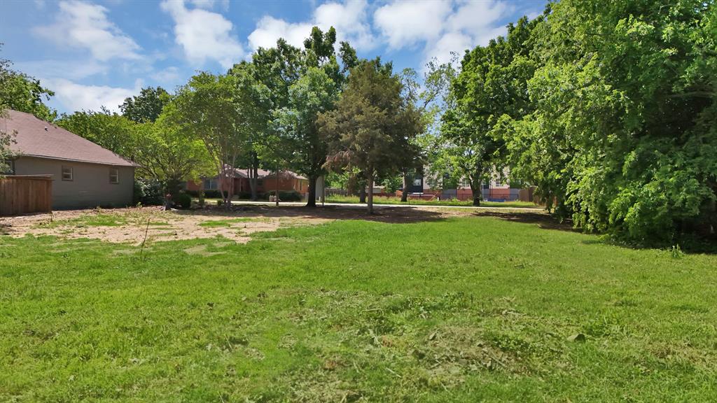 6868 Pecan Street Frisco, TX 75034 - Photo 1 of 8 Expansive green space with mature trees and partial fencing