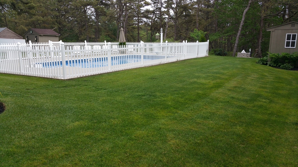 223 Charge Pond Road Wareham, MA 02571 - Photo 10 of 10 a view of a park with bench and trees