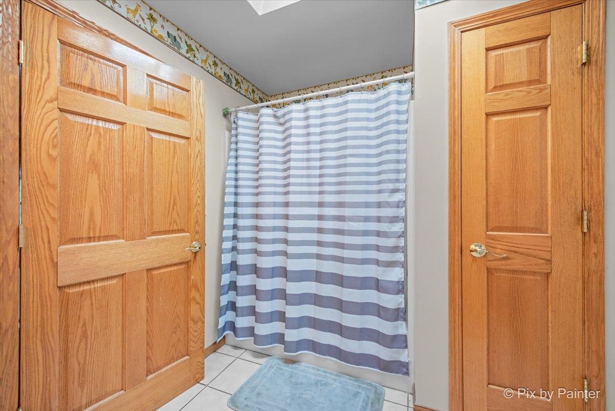10053 Spring Road Garden Prairie, IL 61038 - Photo 17 of 17 a bathroom with a window