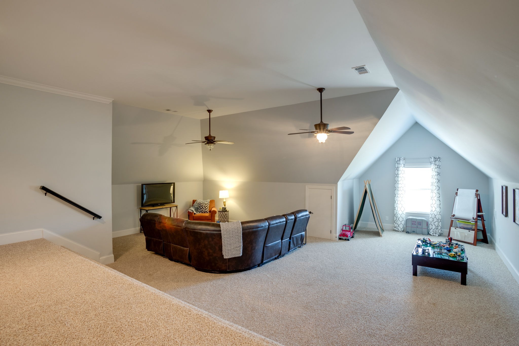 8254 Patterson Road College Grove, TN 37046 - Photo 27 of 30 a living room with furniture and a chandelier