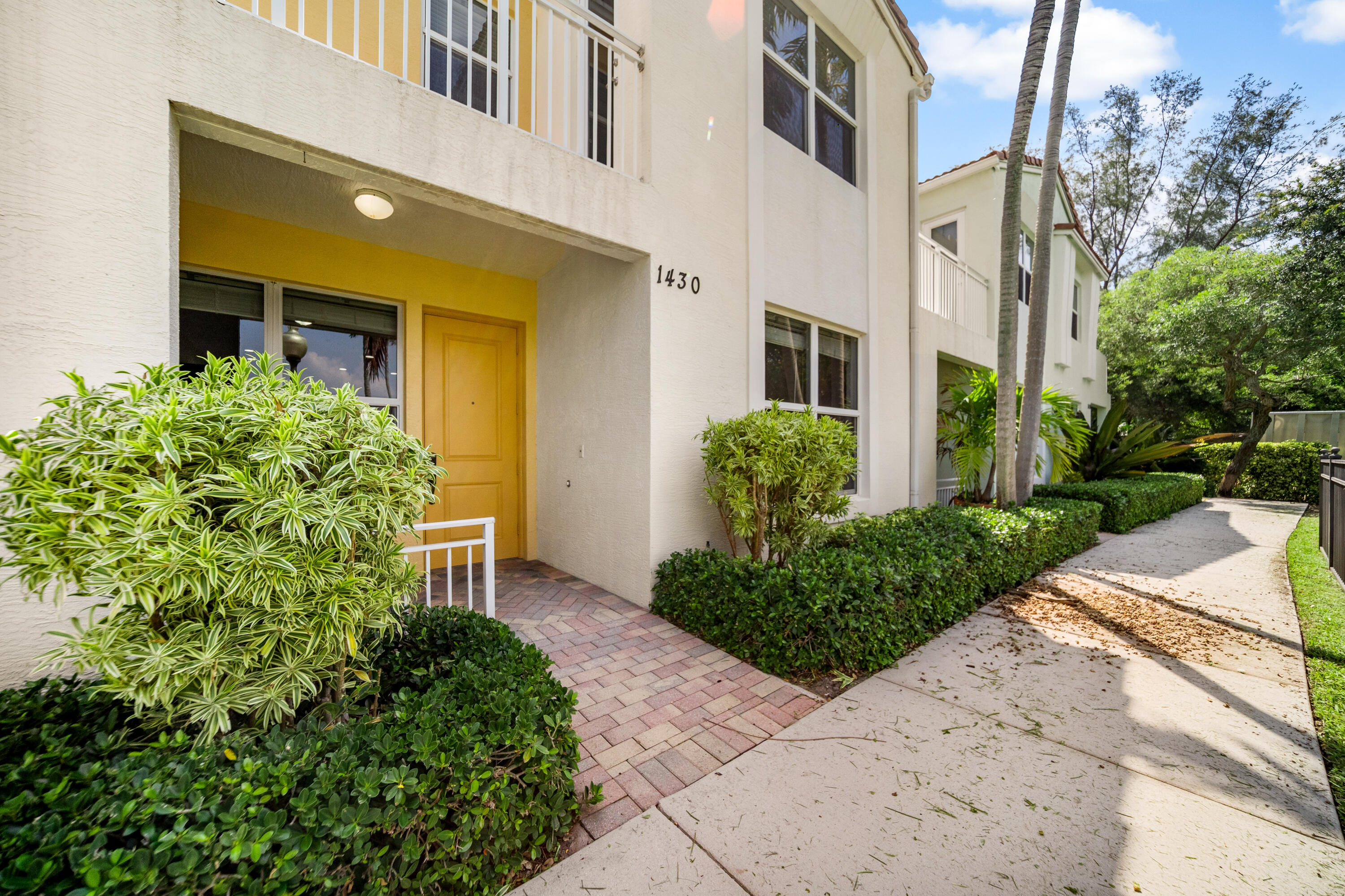 1430 Northwest 48th Lane Boca Raton, FL 33431 - Photo 34 of 54 a view of a building with potted plants
