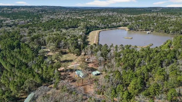 a view of a park with swings and slides