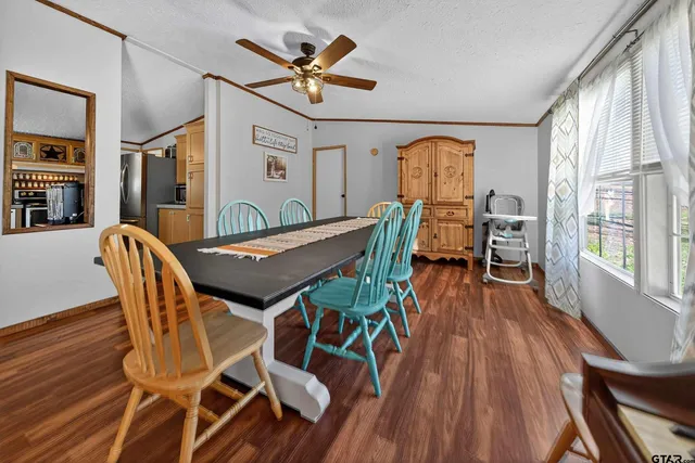 a room with furniture and a book shelf