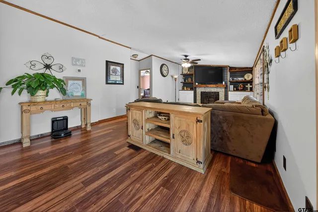 a bathroom with a sink toilet tub and shower