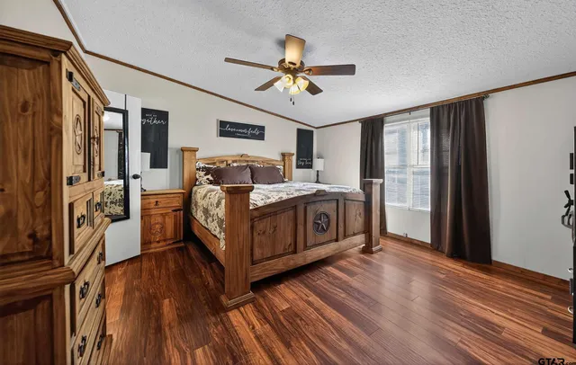 a bathroom with a sink a mirror and a bathtub
