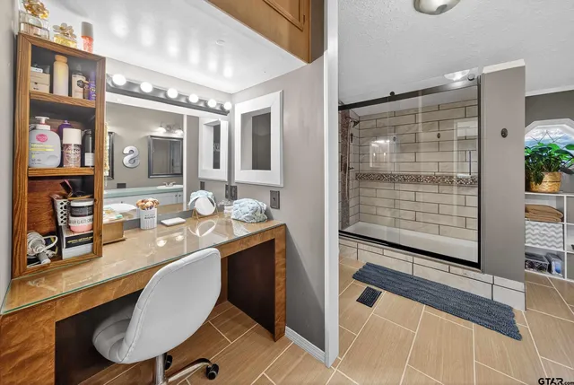 a view of house with large trees and stairs