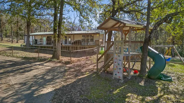 a view of a backyard of the house