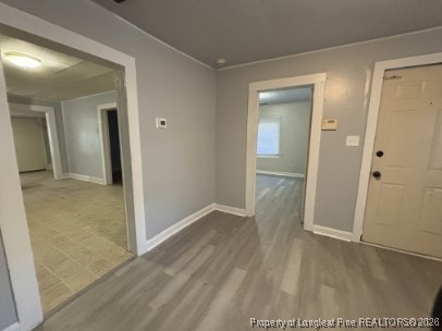 1614 Reeves Street Fayetteville, NC 28306 - Photo 5 of 14 wooden floor in an empty room