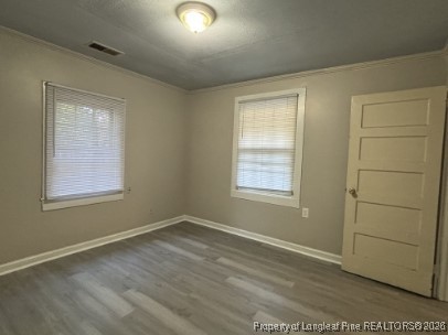 1614 Reeves Street Fayetteville, NC 28306 - Photo 7 of 14 an empty room with a window