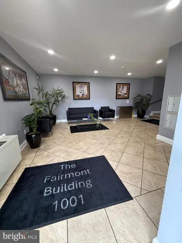 a view of a living room and furniture