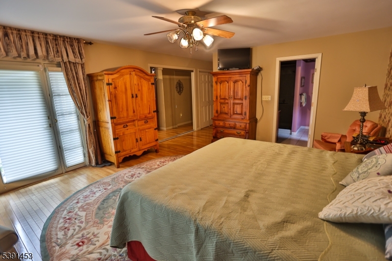47 New Mashipacong Road Montague, NJ 07827 - Photo 23 of 42 a bedroom with a bed and a dresser