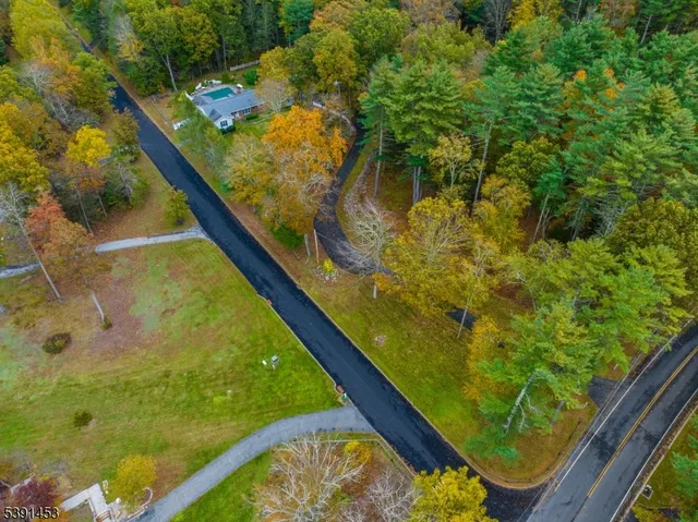 a view of swimming pool from a balcony