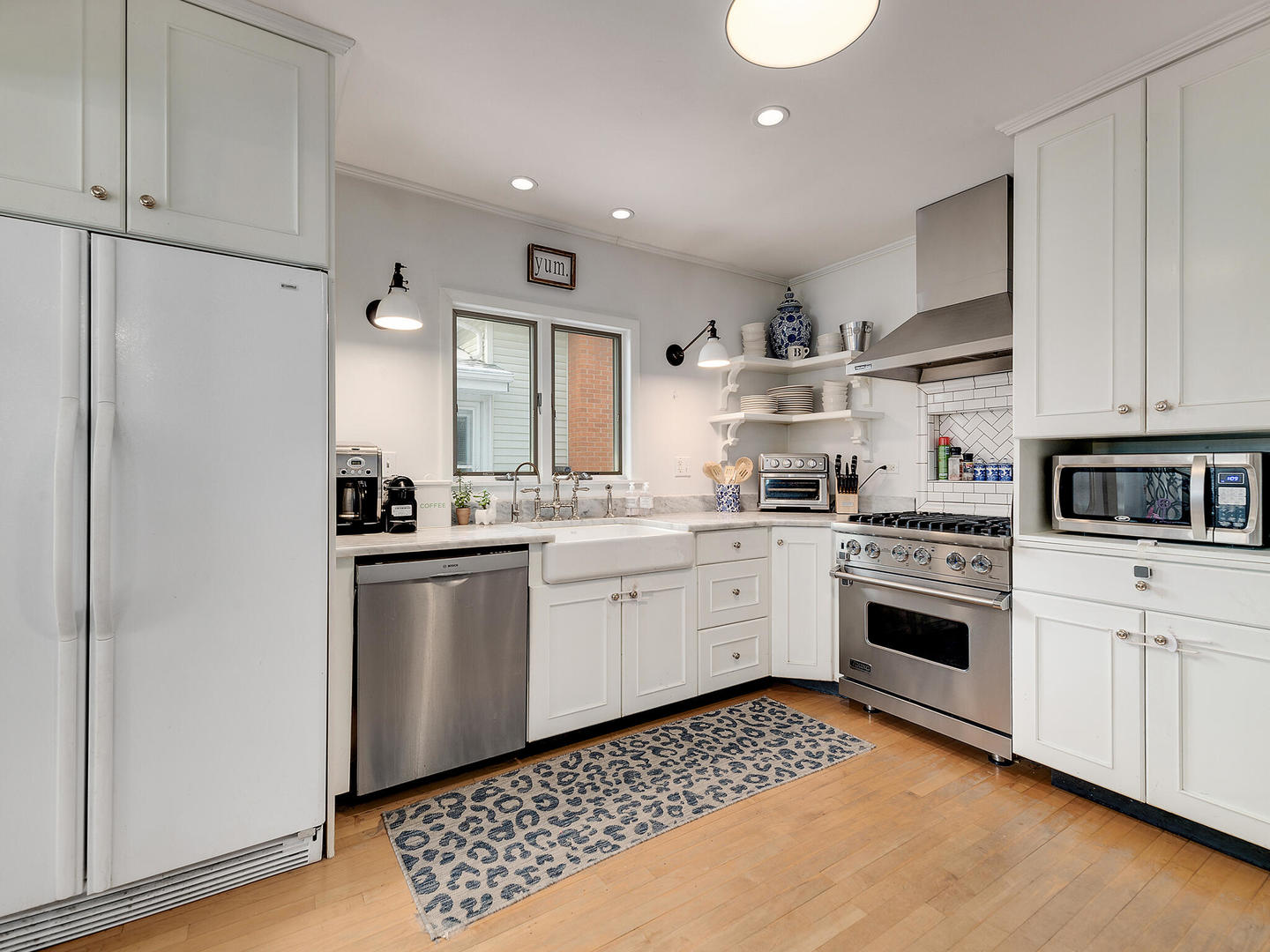 1340 Oak Street Western Springs, IL 60558 - Photo 11 of 25 a kitchen with granite countertop white cabinets and white appliances