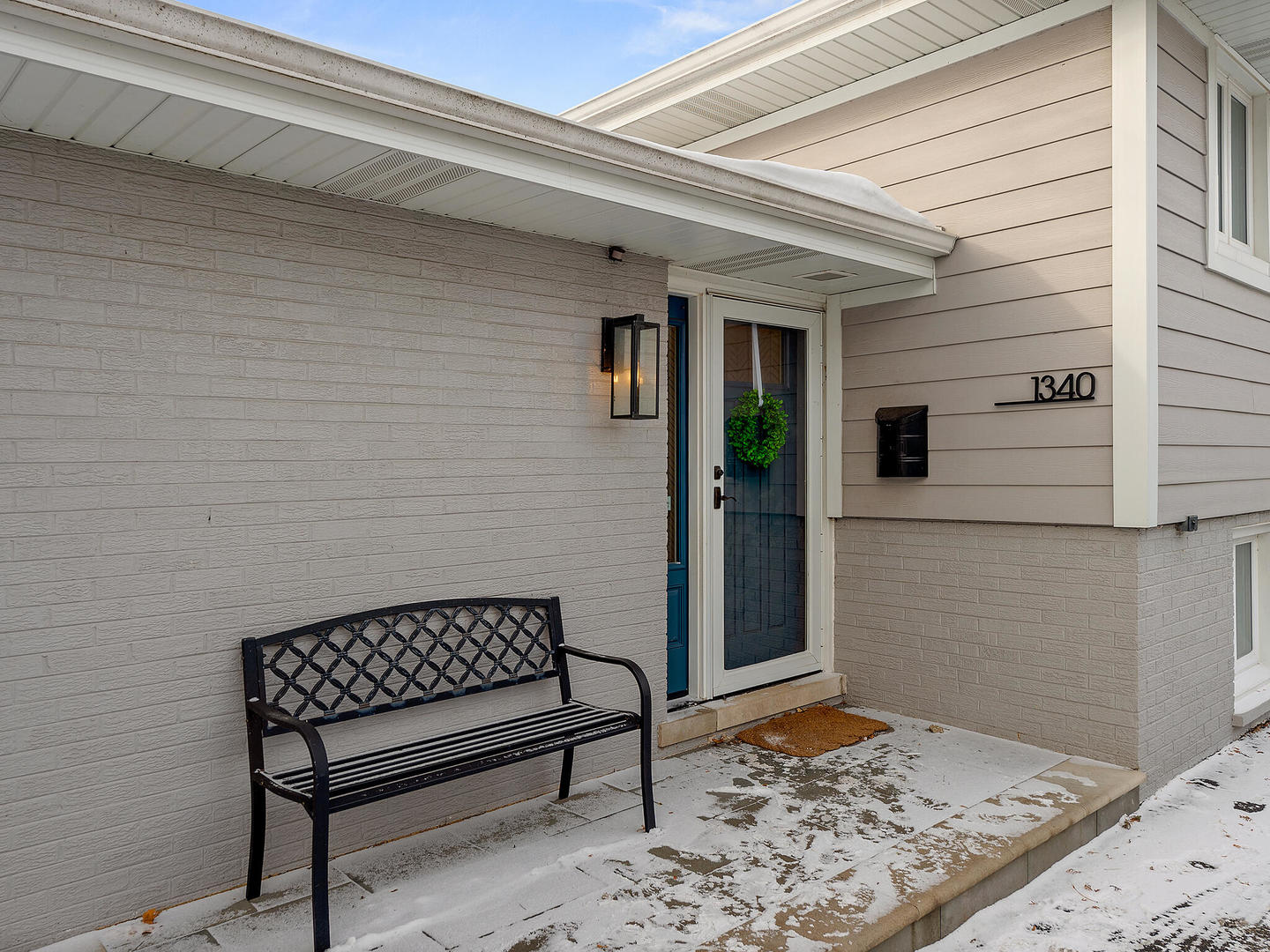 1340 Oak Street Western Springs, IL 60558 - Photo 2 of 25 a view of a wooden bench in a balcony