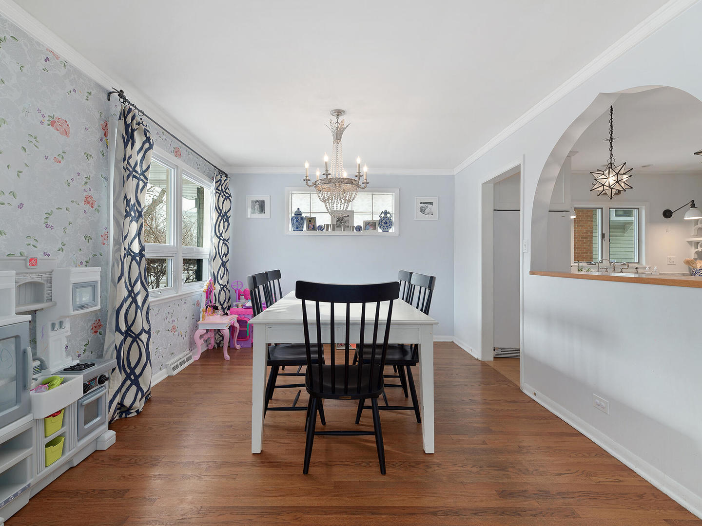 1340 Oak Street Western Springs, IL 60558 - Photo 8 of 25 a view of a dining room with furniture a chandelier and wooden floor