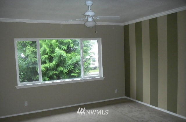 666 Index Place Northeast Renton, WA 98056 - Photo 2 of 11 a view of an empty room with a window