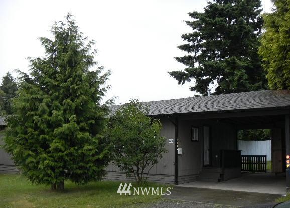 666 Index Place Northeast Renton, WA 98056 - Photo 11 of 11 an outdoor view of a house with garage