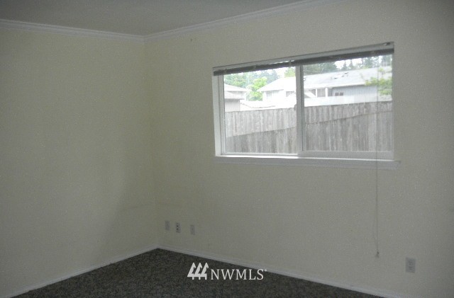 666 Index Place Northeast Renton, WA 98056 - Photo 6 of 11 an empty room with a window