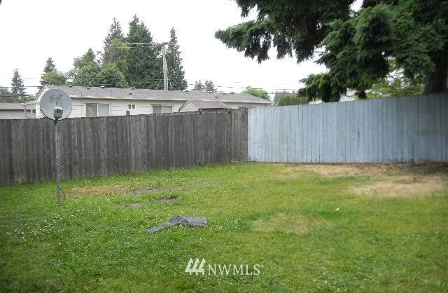 666 Index Place Northeast Renton, WA 98056 - Photo 9 of 11 a view of backyard with wooden fence