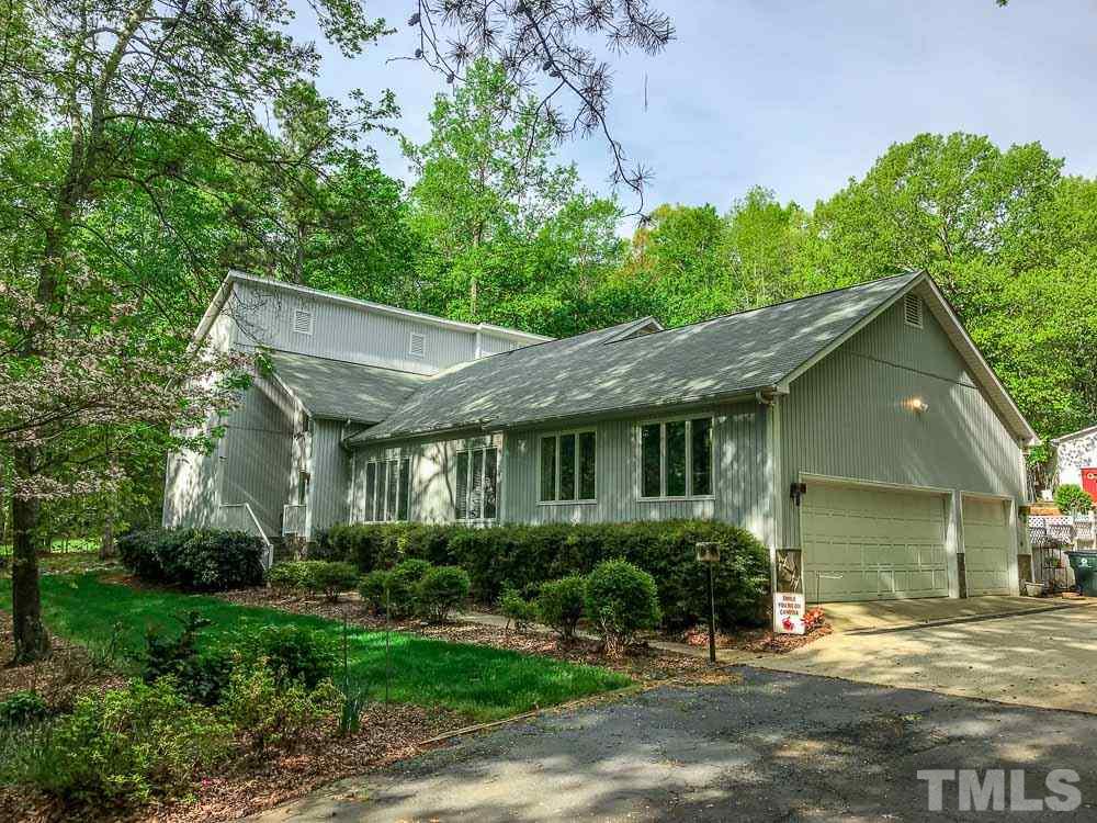 6407 Craig Road Durham, NC 27712 - Photo 1 of 25 Beautiful Contemporary 4 Bedroom, 3.5 Bath home. Landscaped with automatic irrigation system, 3 car side entry garage with asphalt drive.