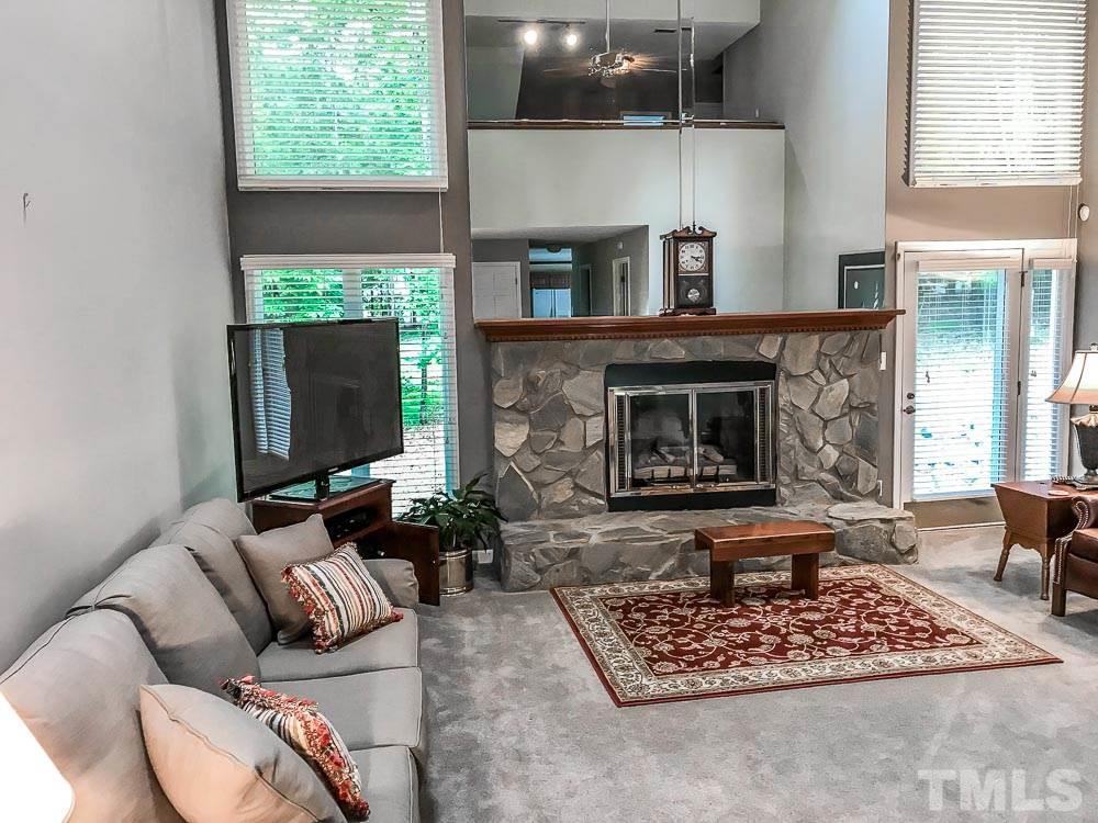 6407 Craig Road Durham, NC 27712 - Photo 8 of 25 The Great Room has two sky lights above which give the space an open feel and lots of light.